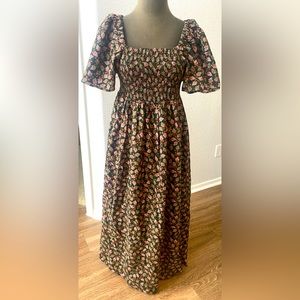 Never worn.  New short sleeved green brown burgundy maxi dress.  Size large.